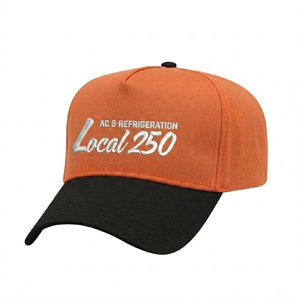 USA-made 5L Blaze Orange-Black Polycotton Twill baseball cap, decorated view, manufactured in Newark NJ